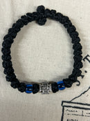 33 knot prayer bracelet with blue bead and metal accent