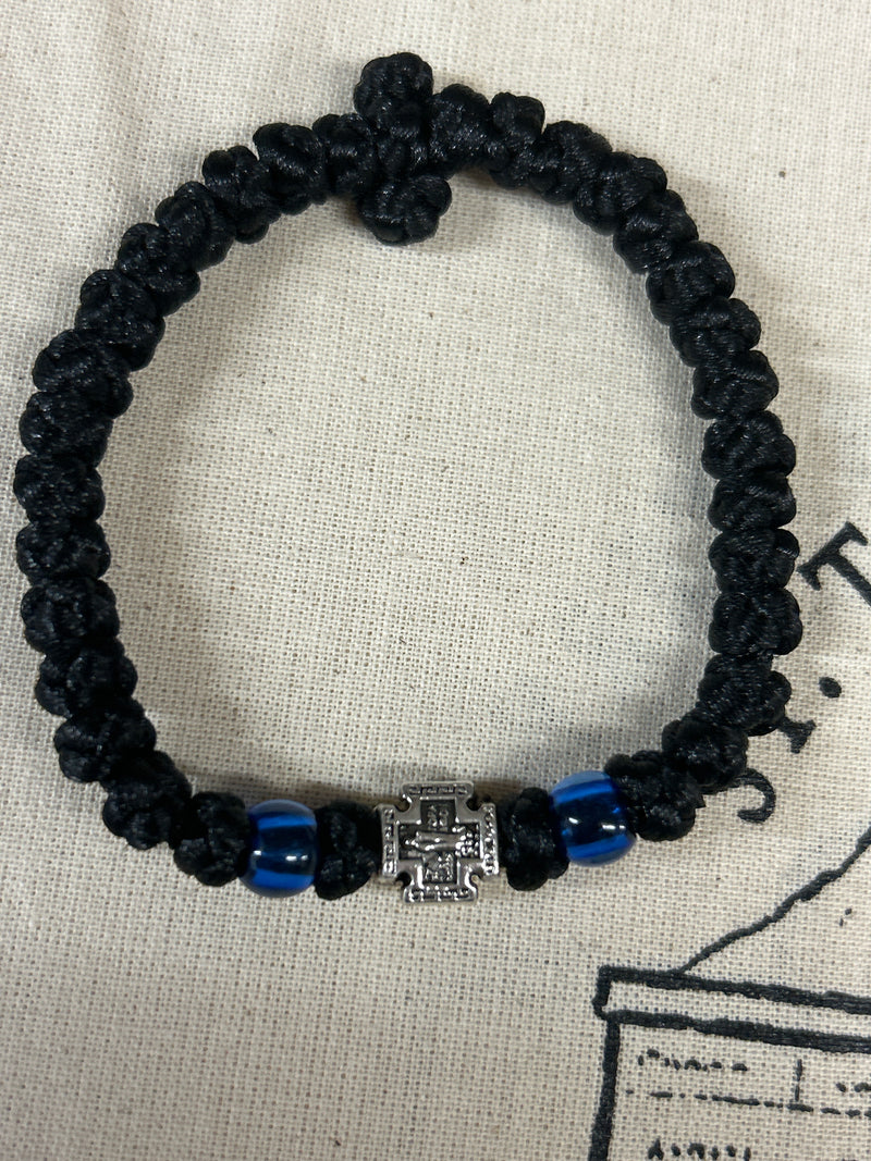 33 knot prayer bracelet with blue bead and metal accent