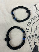 33 knot prayer bracelet with blue bead and metal accent